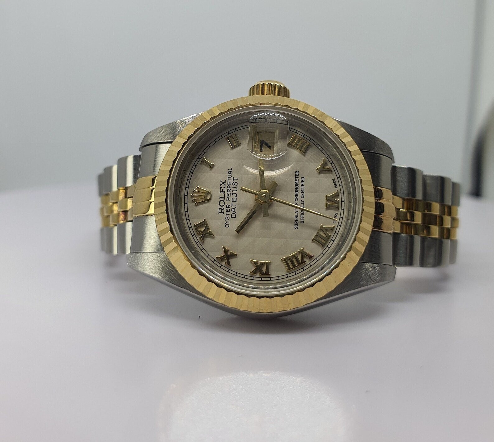 Two Tone 18K Yellow Gold and Steel Pyramid Roman Dial Rolex Datejust Watch