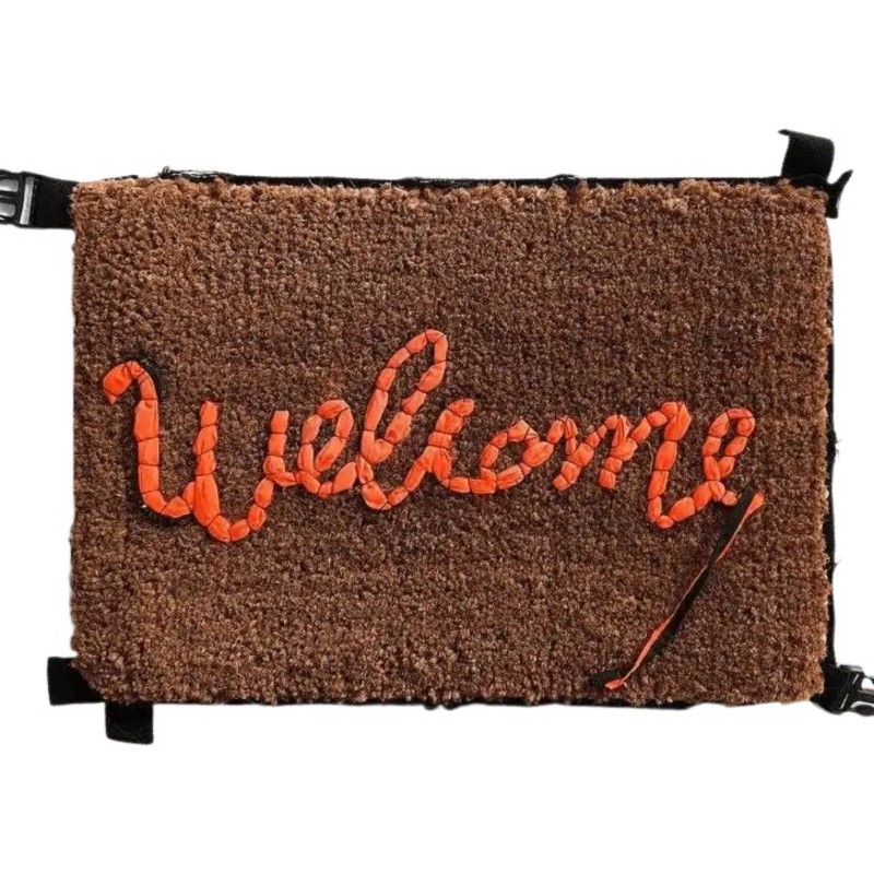 "Welcome Mat - Love Welcomes" artwork by Banksy