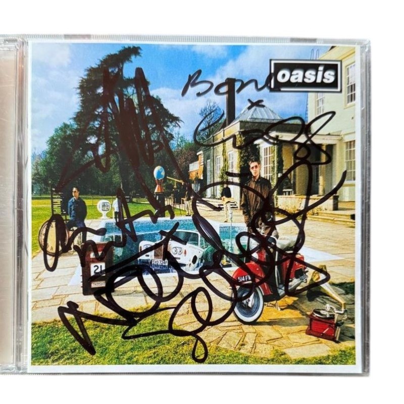 CD "Be Here Now" autografato dagli Oasis