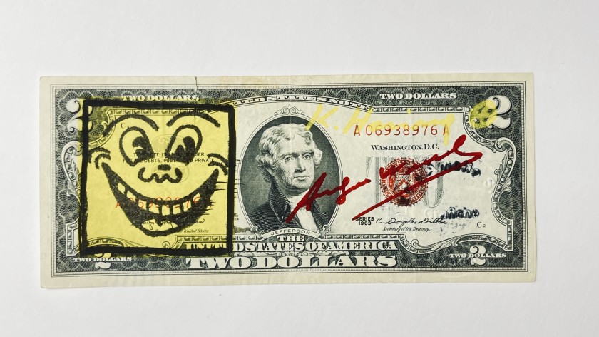 Two dollars signed and hand-drawn by Keith Haring and Andy Warhol