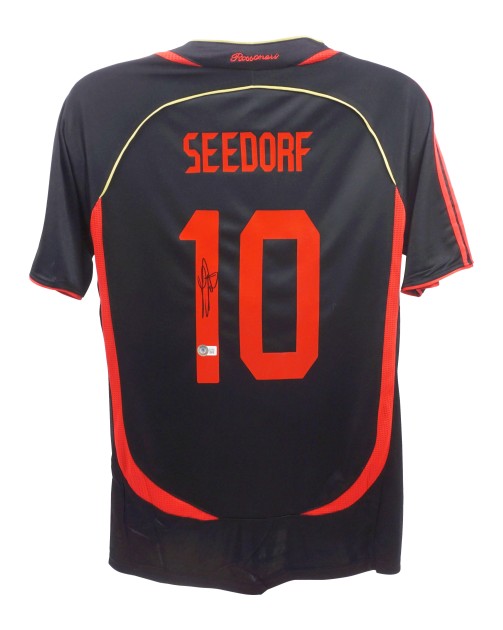 Replica della maglia del Milan firmata da Clarence Seedorf