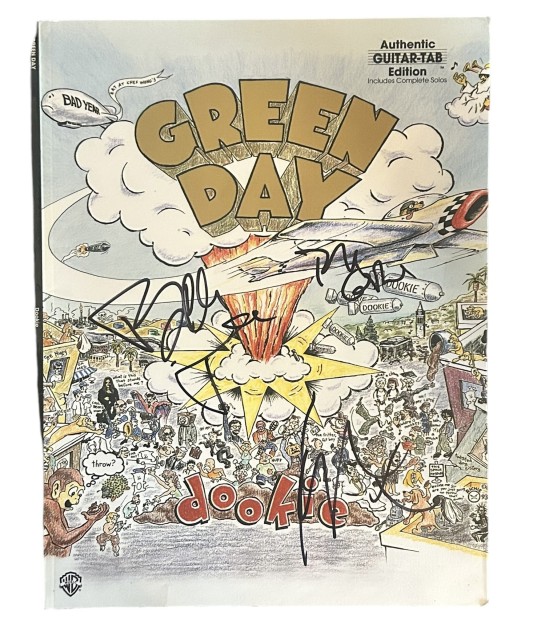 Pagina del libro Dookie firmata dai Green Day