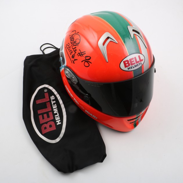 Luca Pini's signed and used helmet and gloves 
