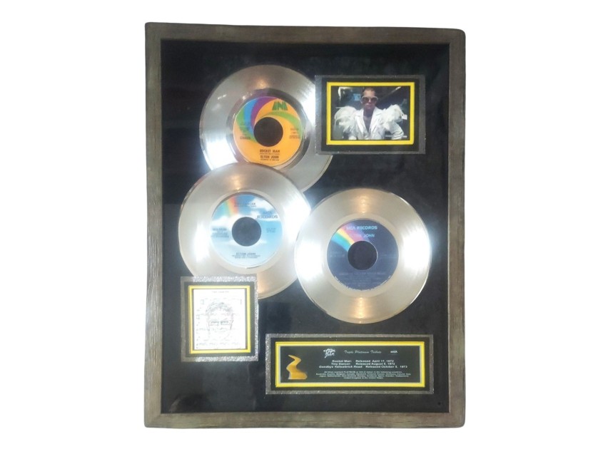 Elton John's Triple Platinum Award