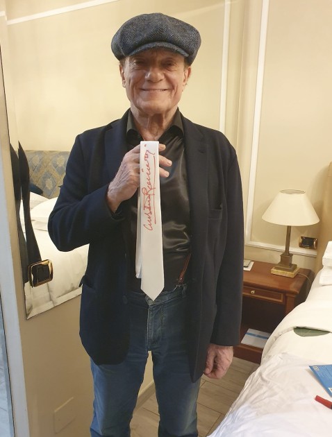 Massimo Ranieri's autographed tie donated for Sanremo 2025