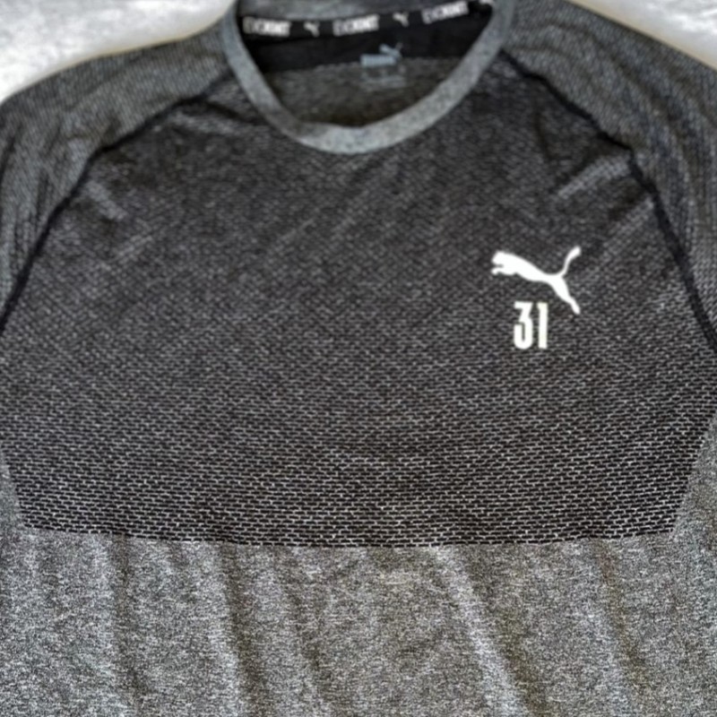 Maglietta nera/grigia allenamento Ederson Manchester City, indossata collezione 22/23