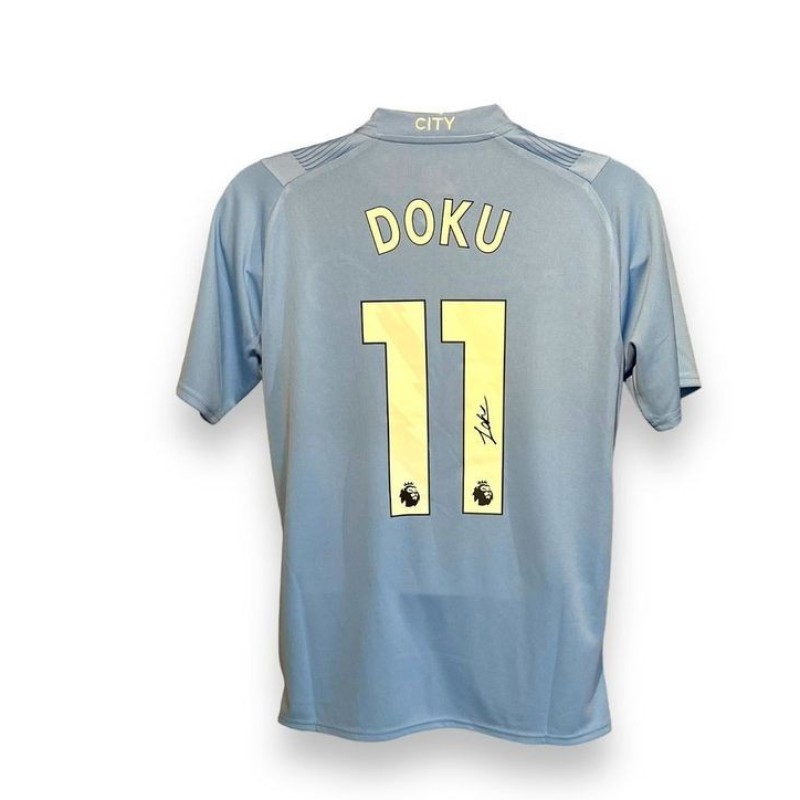 Maglia ufficiale firmata da Jeremy Doku per il Manchester City 2023/24