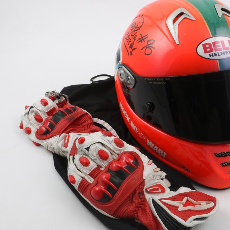 Luca Pini's signed and used helmet and gloves 