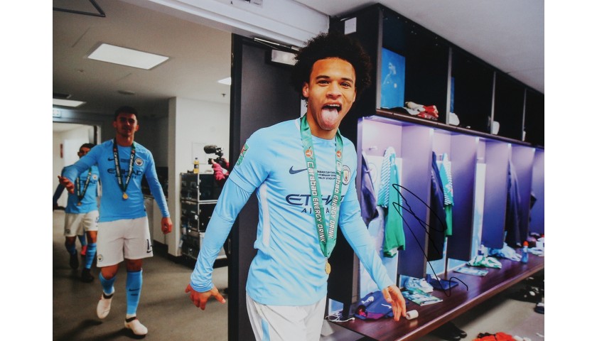 Signed Picture of Manchester City's Leroy Sané Celebrating in the Dressing Room