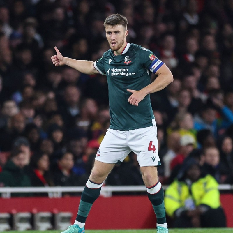 Maglia da trasferta firmata di George Thomason del Bolton Wanderers, contro l'Arsenal