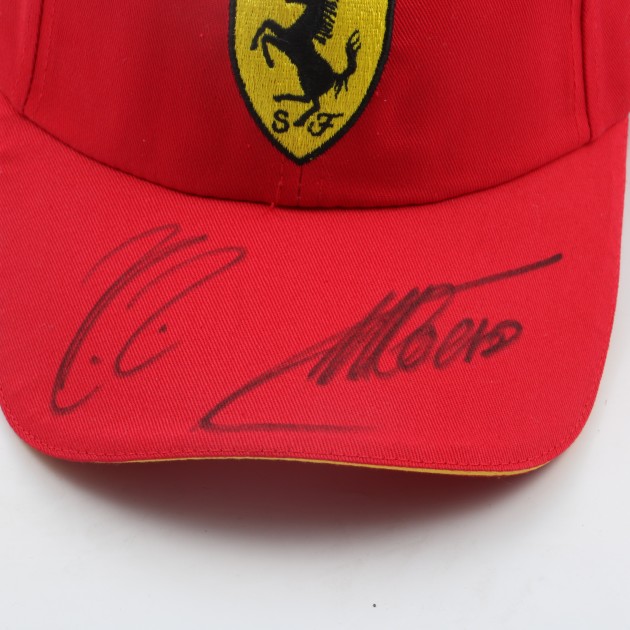 Ferrari cap signed by Alonso and Raikkonen