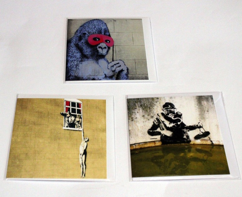 Three official Banksy Bristol Museum greeting cards