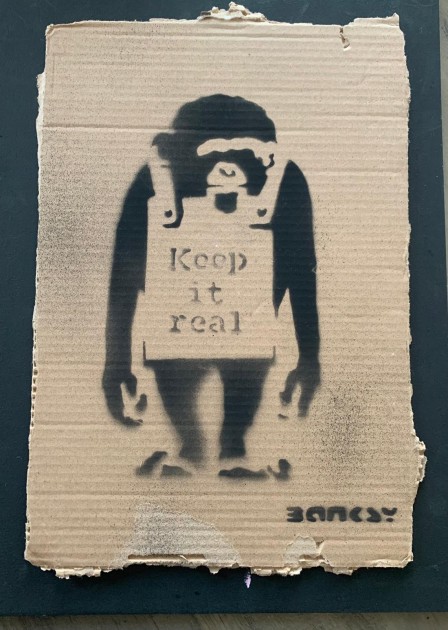 'Keep it Real (Laugh Now)' Cardboard by Banksy - Dismaland Souvenir