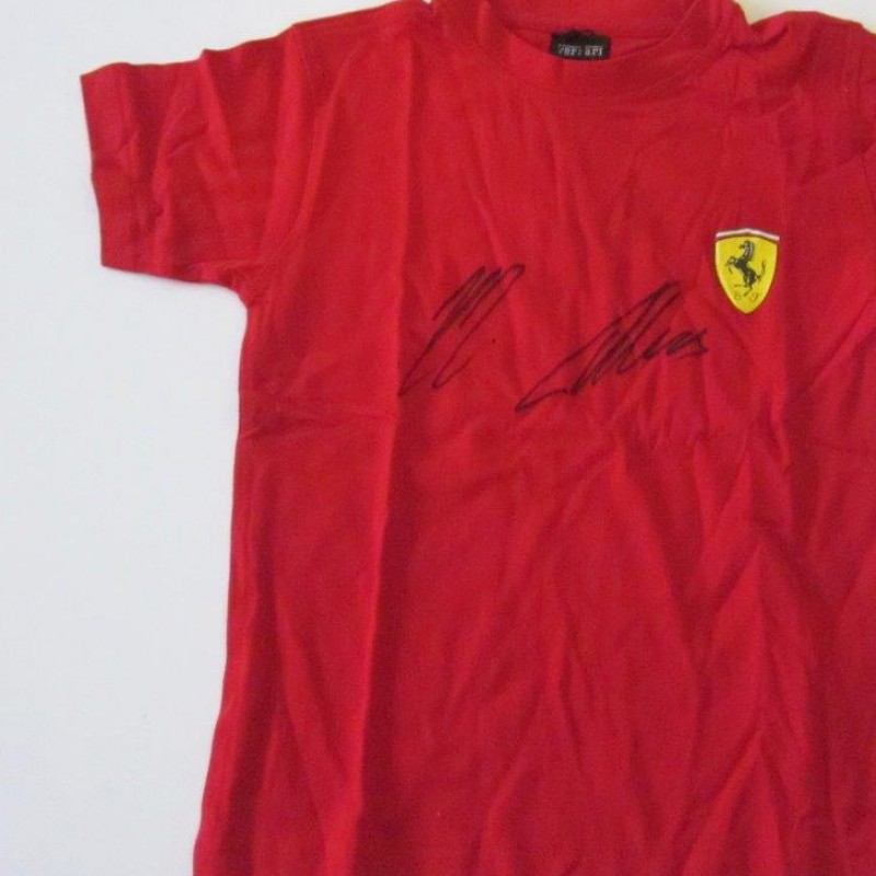 Ferrari childs t-shirt signed by Alonso and Räikkönen
