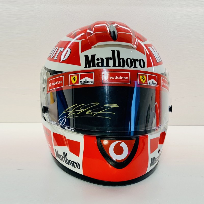 Michael Schumacher, casco ufficiale replica Ferrari autografato