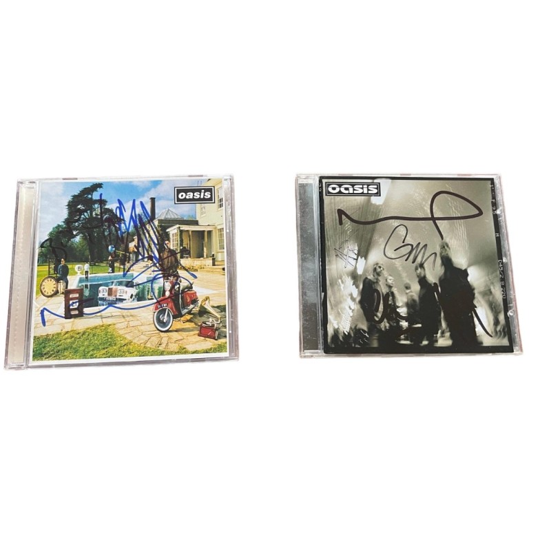 Oasis Signed Two CDs - Package 4