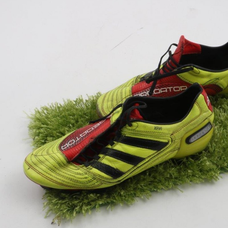 Match boots worn by Xavi Hernandez - signed