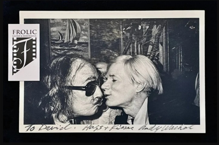 "Kissing Salvador Dalí" Photo Postcard Signed by Andy Warhol