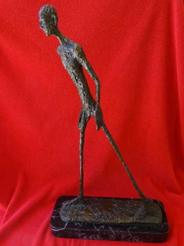 "Walking Man" by Alberto Giacometti