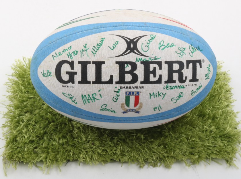 Woman FIR Gilbert Ball signed by the Players and played
