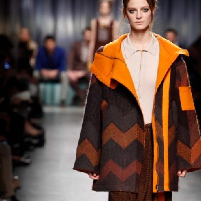 Attend the Missoni runway show during Milan Fashion Week