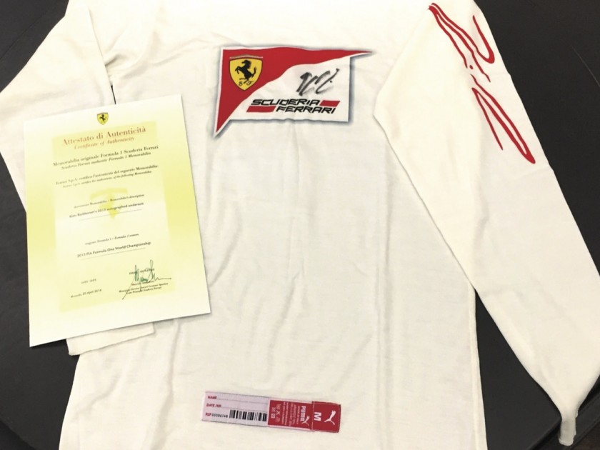 Under tracksuit worn and signed by Kimi Raikkonen  