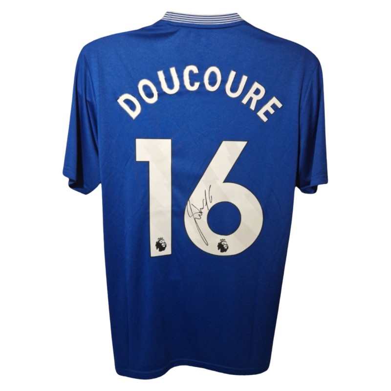 Abdoulaye Doucoure firma la maglia da calcio ufficiale dell'Everton 2024-25