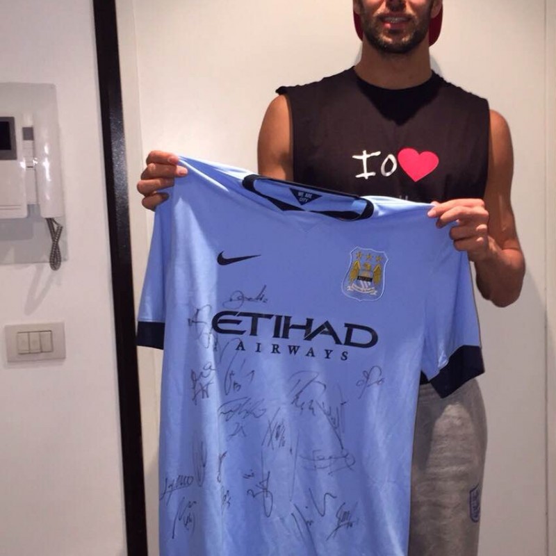 Official Manchester City 2014/2015 shirt, signed by the players
