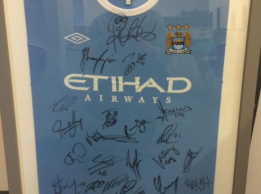 Framed Manchester City 09/10 Home Shirt Signed by the Squad