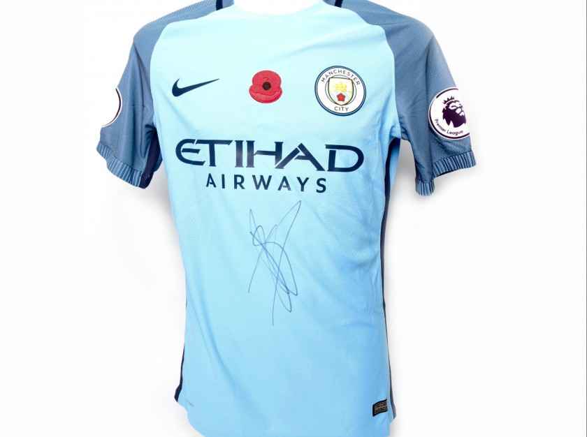 Stones Worn and Signed Manchester City Poppy Shirt