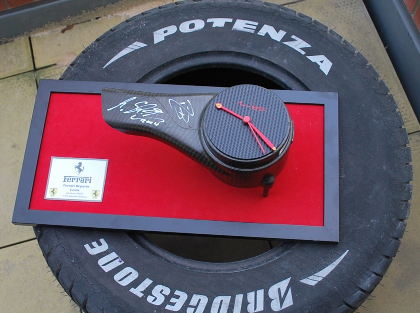Michael Schumacher F2004 brake duct clock signed by the 7 Times F1 World Champion and Barrichello