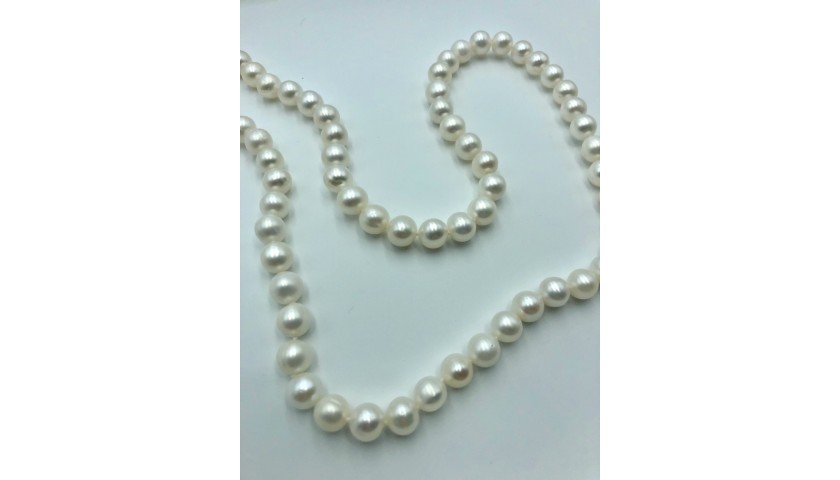 Long Pearl Strand and 14KT Yellow Gold Pearl Studs