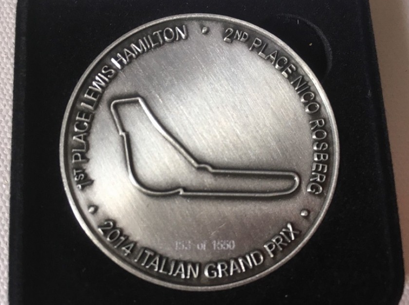 Mercedes F1 2014 F1 medals awarded to the members of the Mercedes F1 team to commemorate there 2014 championship win