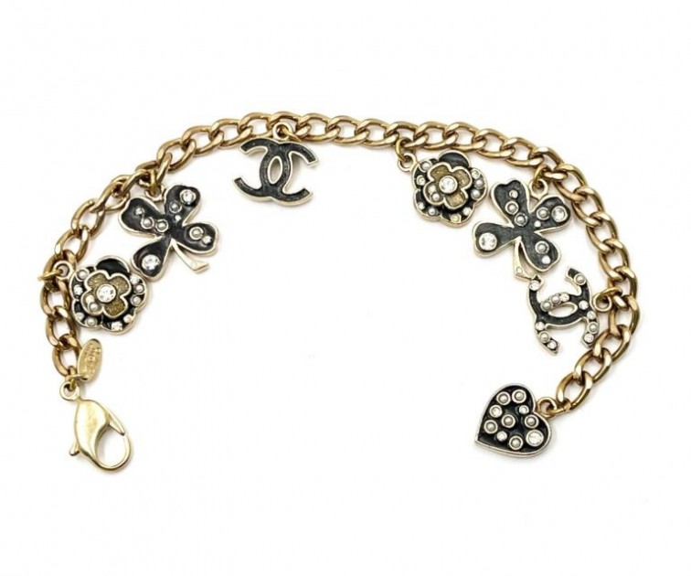 Sold at Auction: Chanel Cream CC Heart Charm Bracelet