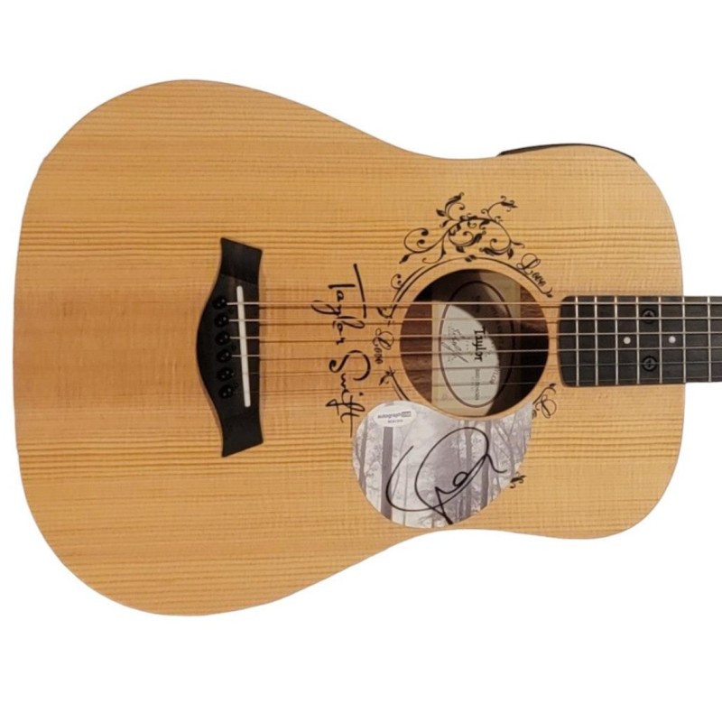Chitarra "Baby Taylor" autografata da Taylor Swift