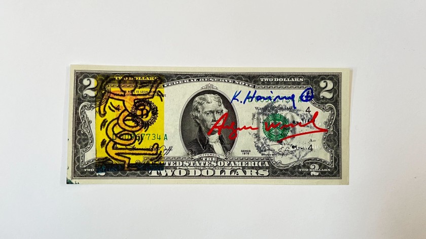 Due dollari firmati a mano da Keith Haring e Andy Warhol