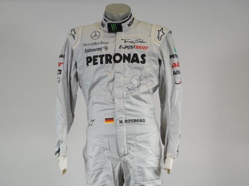 Nico Rosberg Mercedes GP PETRONAS 2011 Alpinestars worn and signed suit + COA