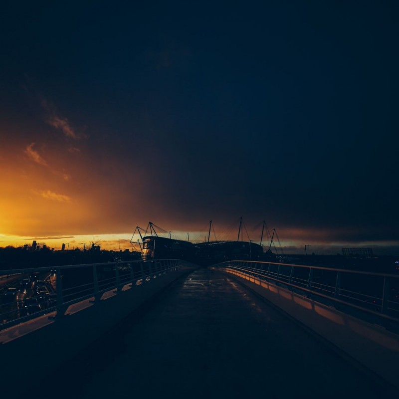 Framed Sunset over the Etihad Stadium Photograph
