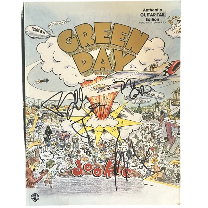 Pagina del libro Dookie firmata dai Green Day