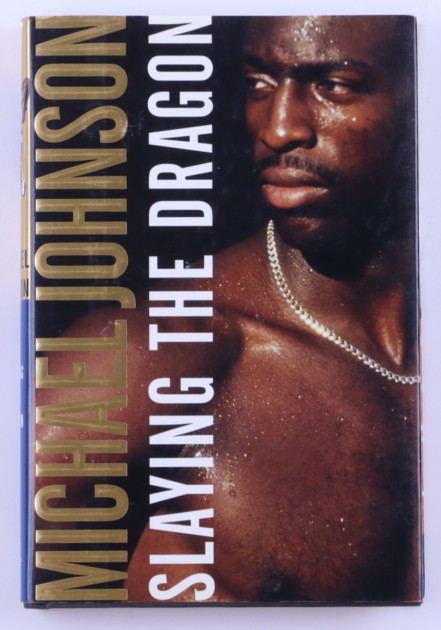 Libro con copertina rigida "Slaying the Dragon" - Autografato da Michael Johnson