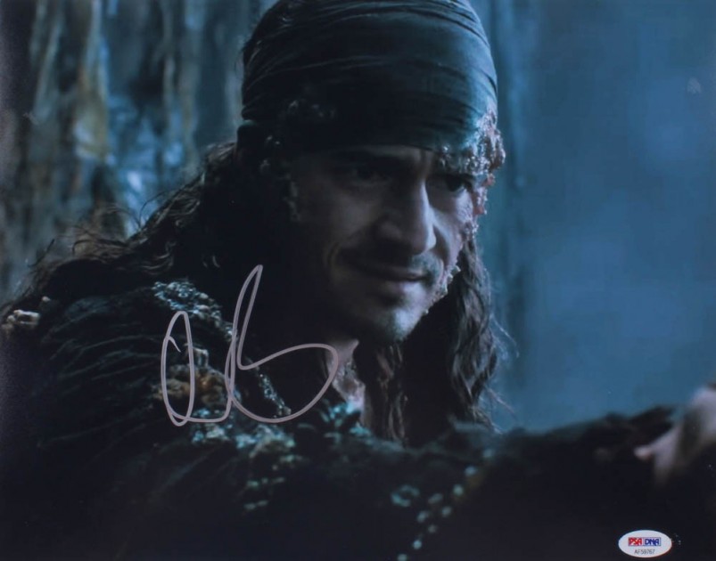 Orlando Bloom Signed "Pirates of the Caribbean: Dead Men Tell No Tales" Photo