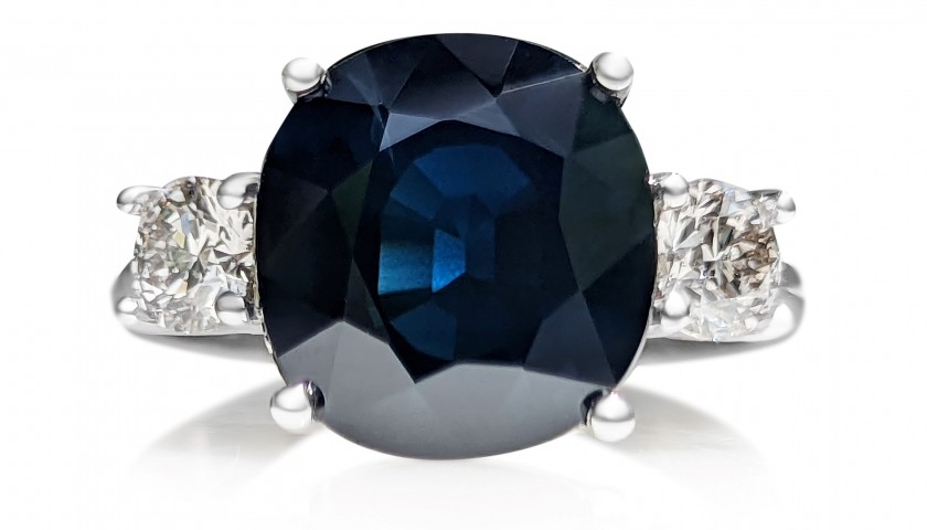 6.50 Carat Blue Sapphire and 0.62 Ct Diamonds 18K White Gold Ring