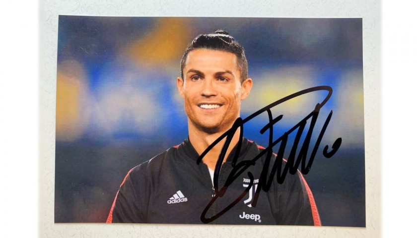 CR7 Museu Ballon d'Or + Cristiano Ronaldo Signed Photograph - CharityStars