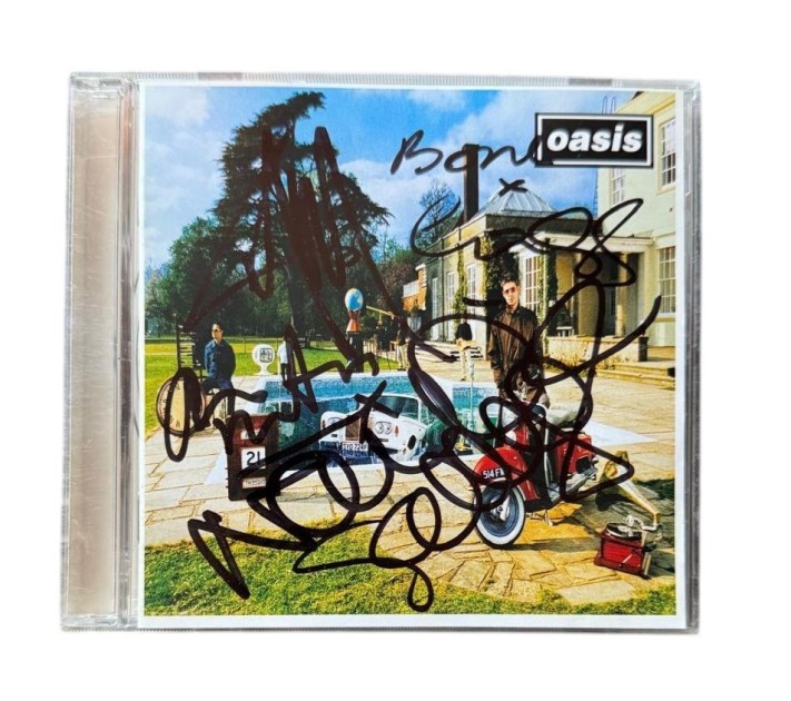 CD "Be Here Now" autografato dagli Oasis