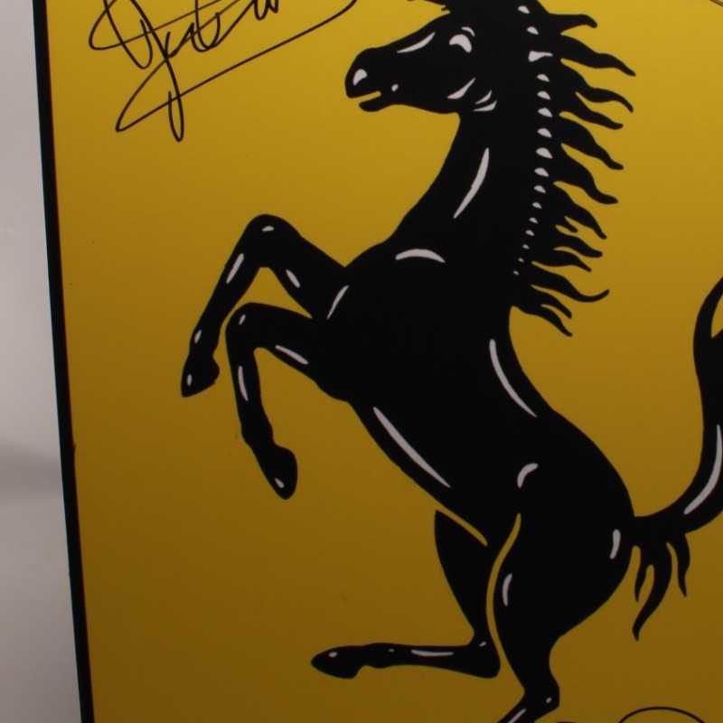 Ferrari Logo Signed by John Surtees, Jody Scheckter and Nigel Mansell