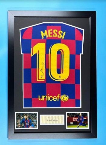 Messi's FC Barcelona Signed and Framed Shirt 