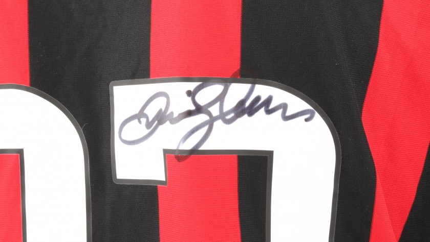 A framed and A.C. Milan football jersey signed by David Beckham