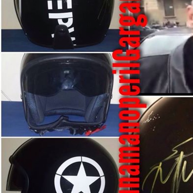 Helmet signed by Eros Ramazzotti