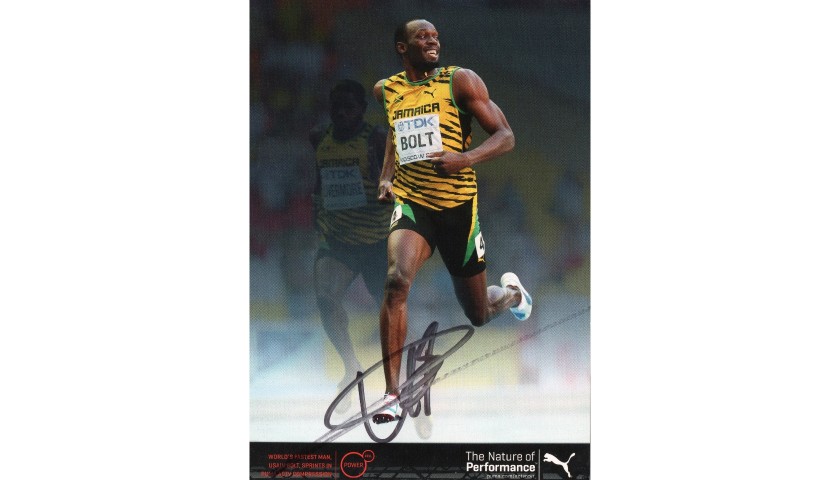 Fotografia cartonata autografata da Usain Bolt