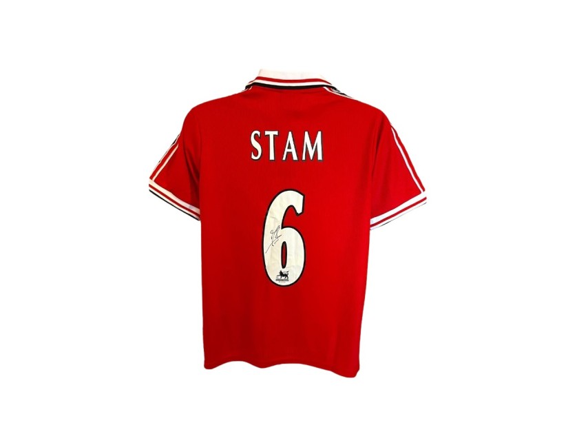 Maglia replica firmata da Jaap Stam per il Manchester United del 1999